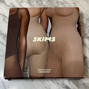 SKIMS, Seamless Sculpt Thong Bodysuit, Ochre, XL